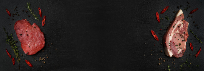 Tasty raw meat with spices on dark background