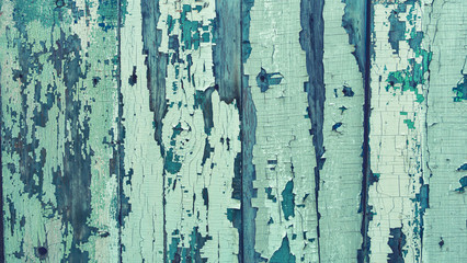 The texture of the blue background of a wooden fence closeup