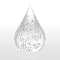 drop of clear water with bubble inside isolated on white background