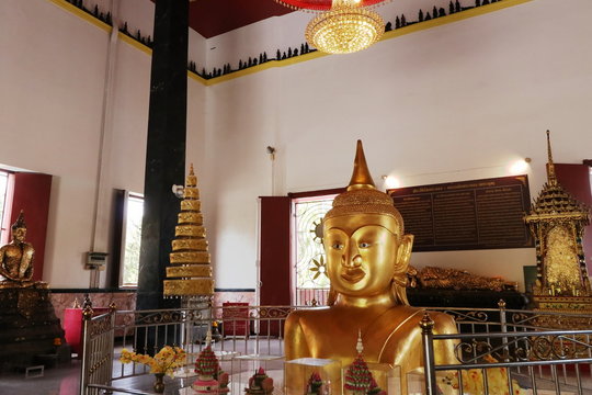 The top half of the Buddha statue at Phra Thong Temple, Phuket, Thailand