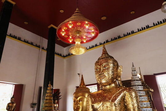 The top half of the Buddha statue at Phra Thong Temple, Phuket, Thailand