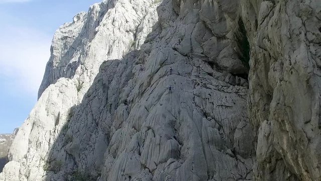 Aerial panoramic view of scenic Samarske Stijene mountains and hikers at Mrkopalj, Croatia