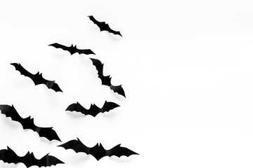 Bats cutout on Halloween frame on white table top view copy space