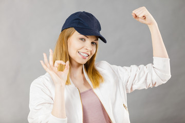 Happy woman wearing sporty outfit