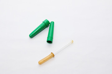 The medicine. Eye dropper. A glass tube with a rubber tip for collecting small amounts of liquid.