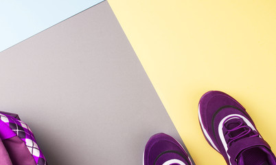 Sports shoes on a colorful background. View from above.