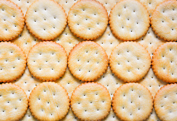 top view stack of round cheese cracker cookies with sugar texture for background