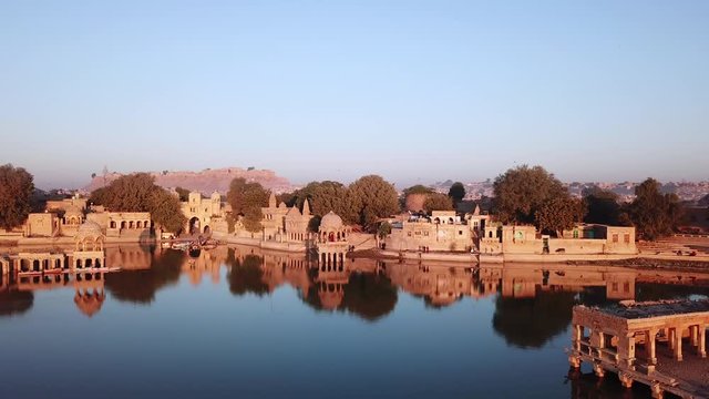 Aerial view 4k video by drone of Shrines And Temples At Gad sisar Lake, Jaisalmer, India - Rajasthan.