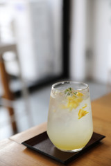 Lemonade or mojito cocktail with lemon and mint, cold refreshing drink or beverage with ice