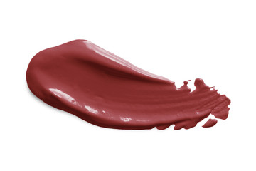Lipstick swatch smear smudge isolated on white background.  Nude  color creme lip stick texture. Creamy makeup brushstroke swipe sample