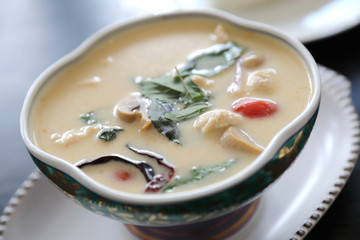 Coconut milk soup with chicken and rice , traditional Thai food