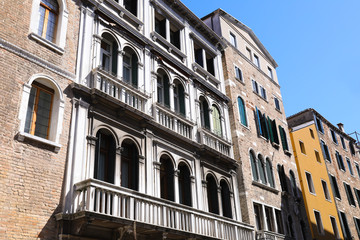 Fototapeta na wymiar View of beautiful old buildings with windows