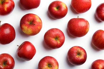 Ripe juicy red apples on white background, top view