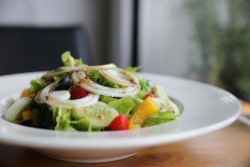 Caesar Salad on wood background
