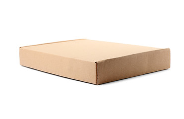 Closed cardboard box on white background. Mockup for design