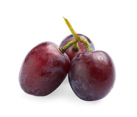 Fresh ripe juicy pink grapes isolated on white