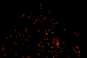 flame of fire with sparks on a black background