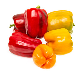 yellow and red bell peppers on a white background