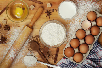 Food ingredients for baking: flour, eggs, milk, sugar