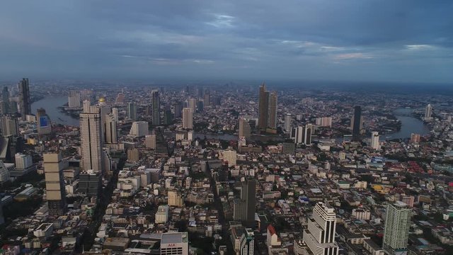 4K aerial drone footage of Bangkok skyline, Great sunset scene. Fantastic landscape. Business city, view of Bangkok downtown, Flying over Bangkok, Thailand.