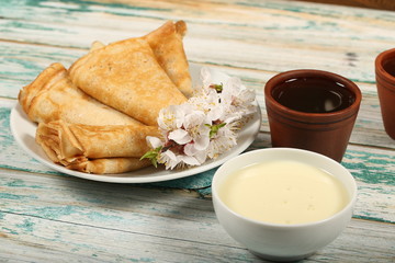 homemade thin pancakes are on the plate