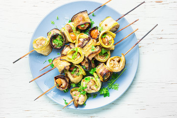 Eggplant with meat on skewers