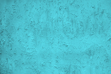 Abstract detail pattern of turquoise blue coloring rough surface cement wall textured background.