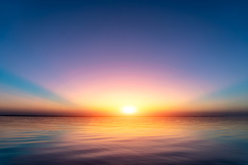 Sunset view above water