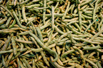 Green asparagus beans. Textured background.