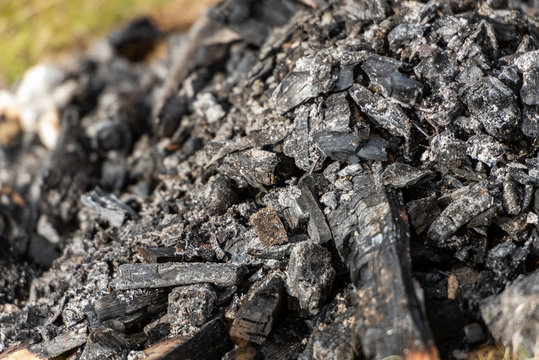 Details of charcoal burning on pit fire. Texture image