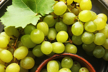 Ripe sweet grapes on plate