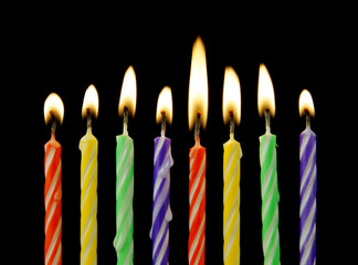 Eight burning birthday candles 
