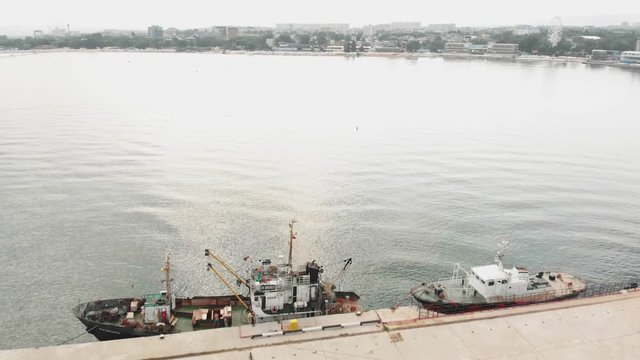 Dock for yachts and ships at sea. Aerial shot
