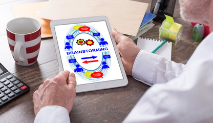 Brainstorming concept on a tablet