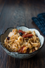 Cabbage Salad with Caramelized Onions, Dried Tomatoes and Currants.