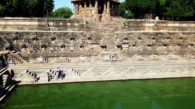 reflection of Sun Temple the green water of Sun Kund (water reservoir)