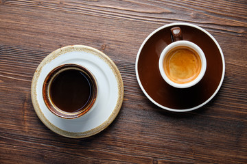 Cappuccino on a brown wooden background. Menu