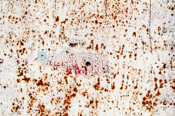 Metal texture with scratches and cracks which can be used as a background