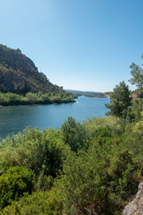 Fototapeta na wymiar The Ebro river next to the greenway of Tarragona