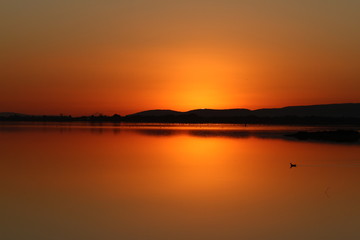 Naklejka premium sunset on the ponds