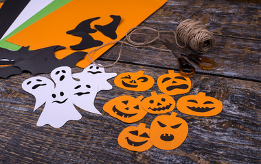 Materials for decorating the holiday Halloween on a wooden table. Flat lay.