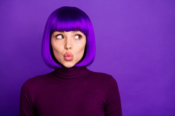 Close up photo of cute girl look at copy space wearing turtleneck isolated over purple violet background