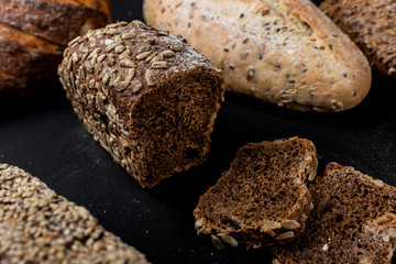 Bread on a black background. Close-up.