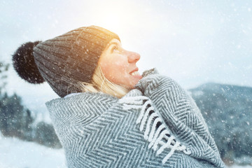 Portrait Happy woman traveler on the snowy of mountain look on t
