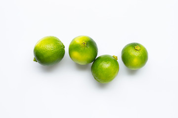 Fresh limes isolated on white