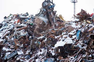 Crane-loading scrap in a train