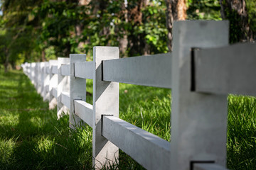 White cement fence