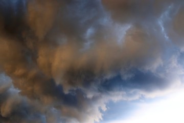 Dramatic cumulonimbus clouds right before and during a thunderstorm over northern europe
