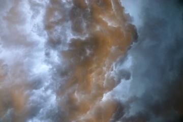 Dramatic cumulonimbus clouds right before and during a thunderstorm over northern europe