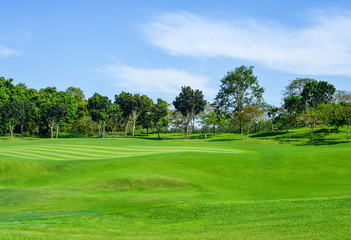 Fototapeta na wymiar View of Golf Course with putting, .thailand Golf course with a rich green turf beautiful scenery.